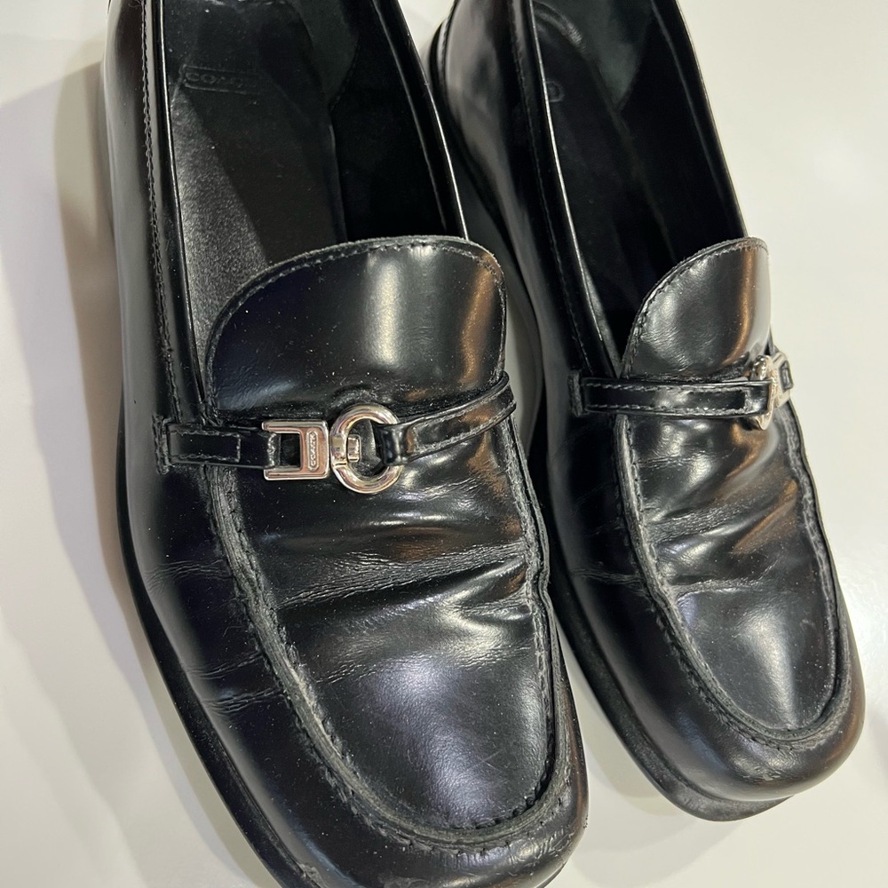 Black leather Coach loafers, size 9B.